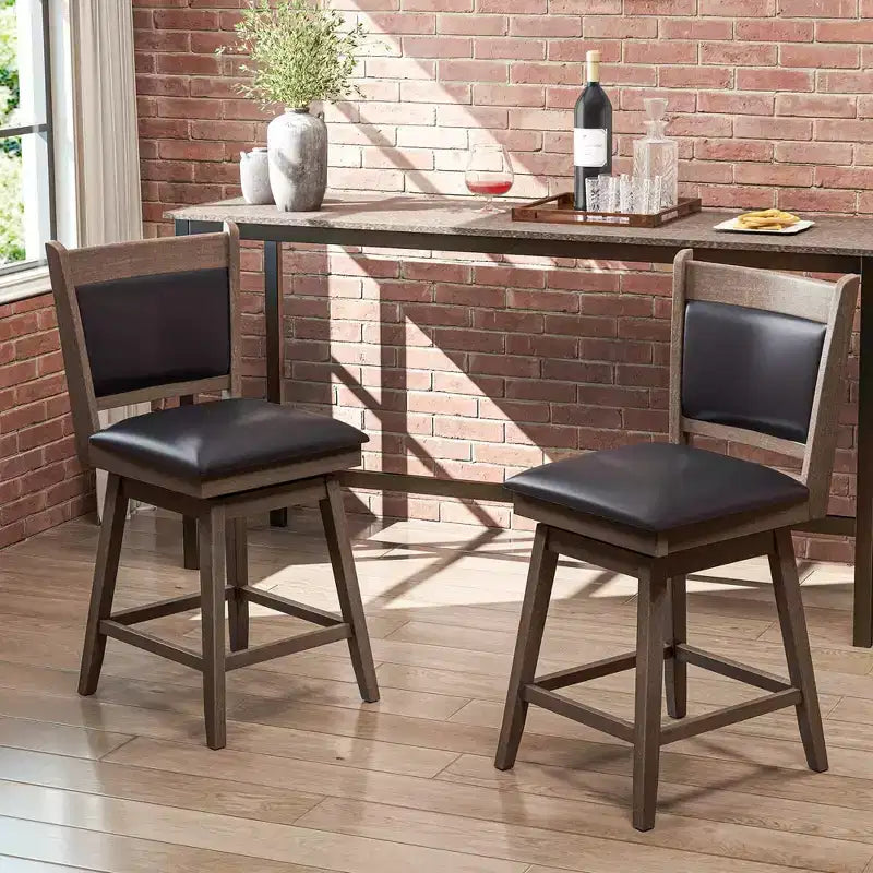 Lot de 2 tabourets de bar pivotants Costway 25" avec dossier, pieds en bois de caoutchouc, repose-pieds robuste