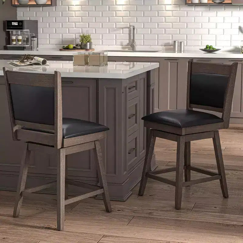 Lot de 2 tabourets de bar pivotants Costway 25" avec dossier, pieds en bois de caoutchouc, repose-pieds robuste