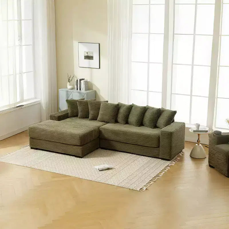 Canapé d'angle en velours côtelé et bois GDFStudio Isabel 111 avec huit oreillers