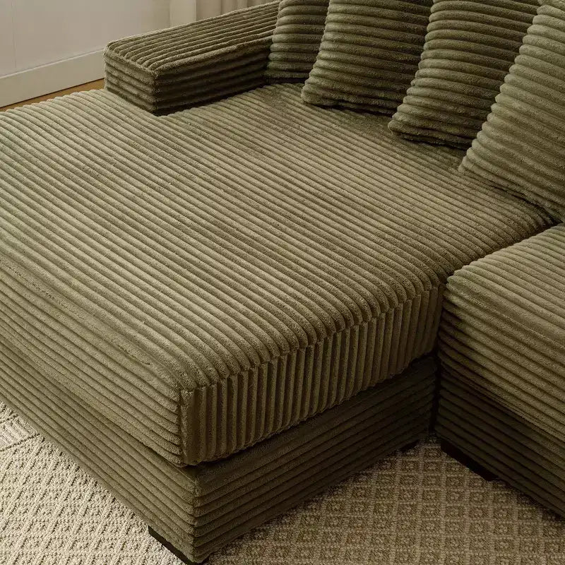 Canapé d'angle en velours côtelé et bois GDFStudio Isabel 111 avec huit oreillers