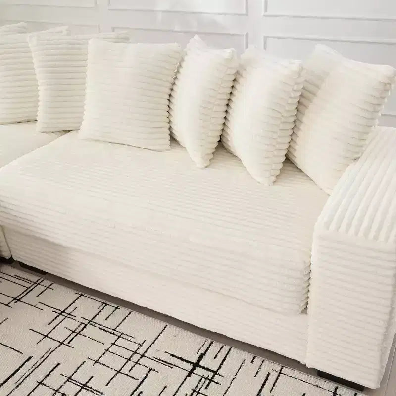 Canapé d'angle en velours côtelé et bois GDFStudio Isabel 111 avec huit oreillers