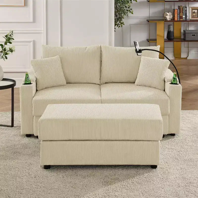 Causeuse moderne en velours côtelé GDFStudio Jean 73 avec porte-gobelets, rangement dans les accoudoirs, support de téléphone portable et pouf