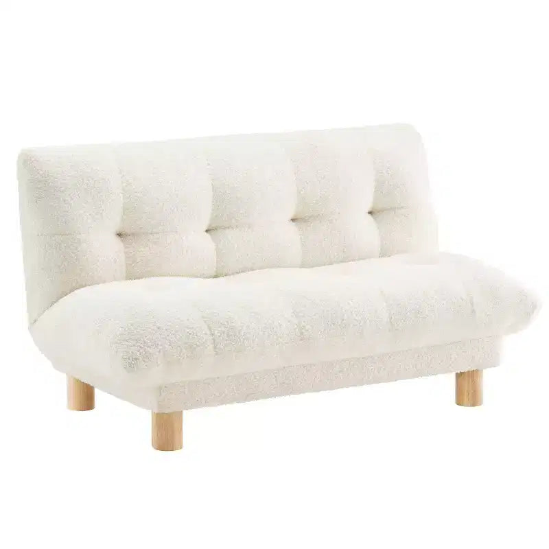 Canapé Enfant Rembourré en Fausse Fourrure de Mouton Buzz & Bloom avec Assise et Dossier Capitonnés, Pieds en Bois Guimauve