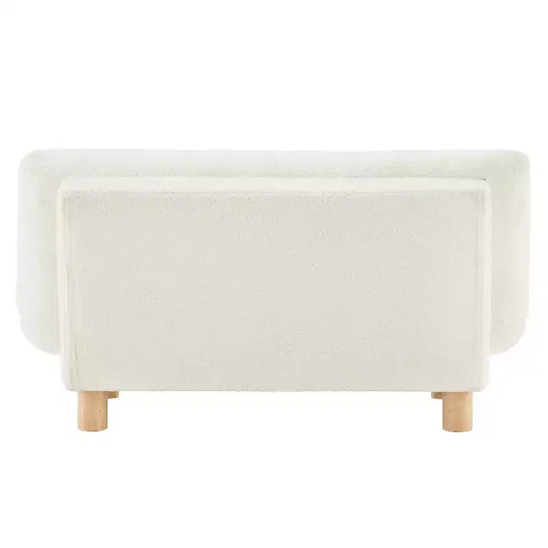 Canapé Enfant Rembourré en Fausse Fourrure de Mouton Buzz & Bloom avec Assise et Dossier Capitonnés, Pieds en Bois Guimauve