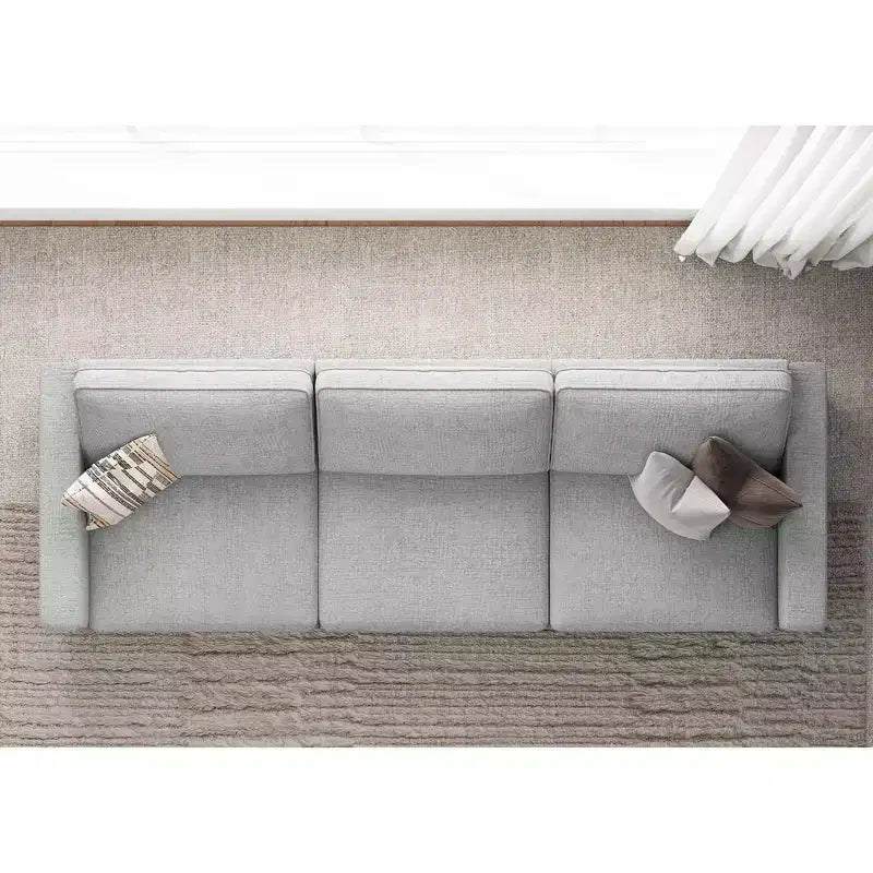 Canapé d'angle modulable 3 places en chenille Belffin – avec pouf de rangement et assise très profonde