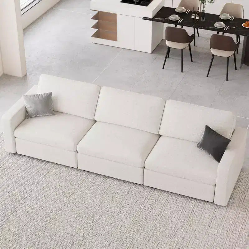 Canapé d'angle modulable 3 places en chenille Belffin – avec pouf de rangement et assise très profonde