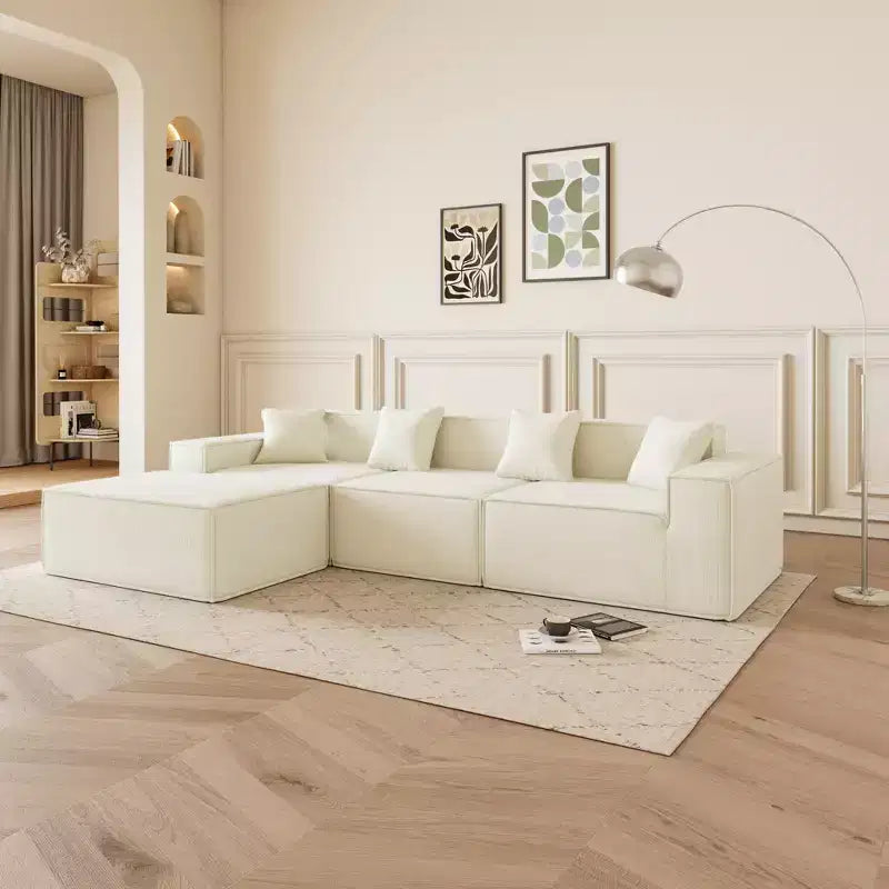 Canapé sectionnel GDFStudio Nira moderne de 277 cm à 3 places réversible sans cadre, recouvert de velours côtelé, avec pouf et 4 oreillers