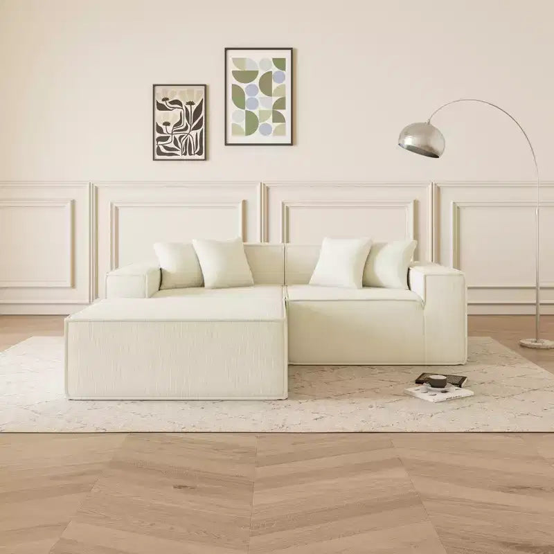 Canapé sectionnel GDFStudio Nira moderne de 277 cm à 3 places réversible sans cadre, recouvert de velours côtelé, avec pouf et 4 oreillers