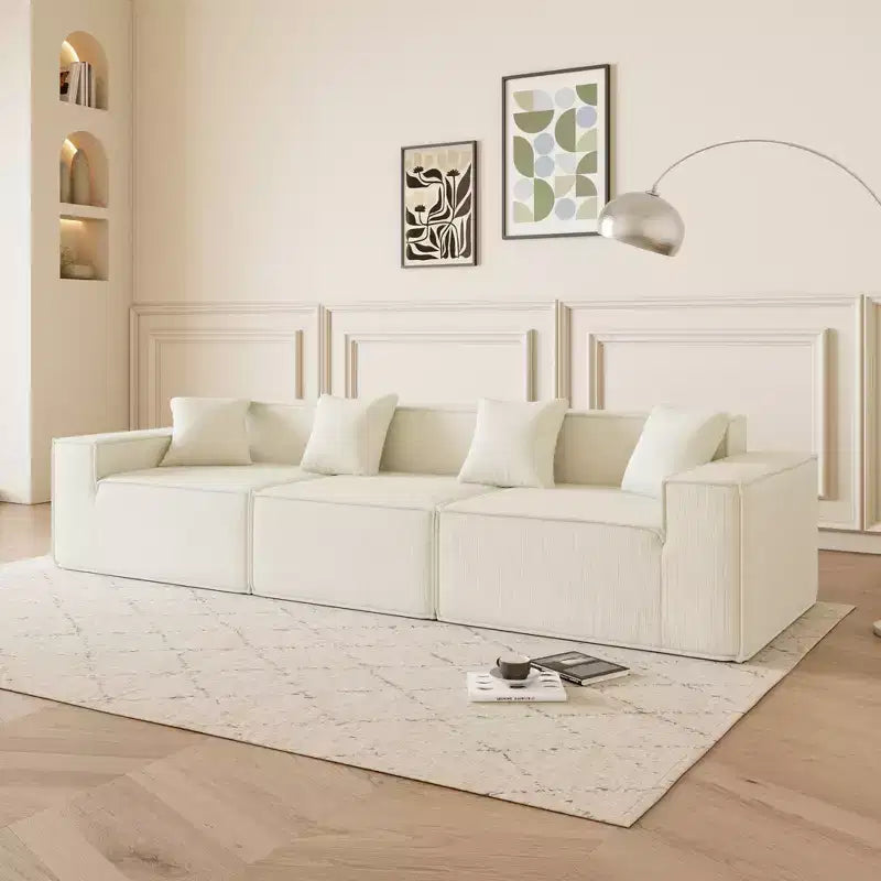 Canapé sectionnel GDFStudio Nira moderne de 277 cm à 3 places réversible sans cadre, recouvert de velours côtelé, avec pouf et 4 oreillers