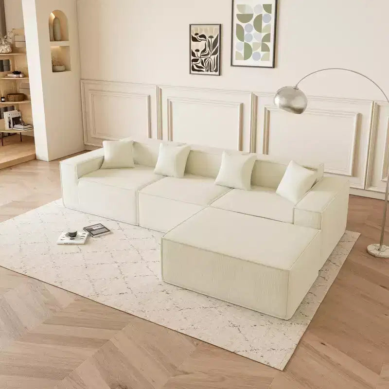 Canapé sectionnel GDFStudio Nira moderne de 277 cm à 3 places réversible sans cadre, recouvert de velours côtelé, avec pouf et 4 oreillers