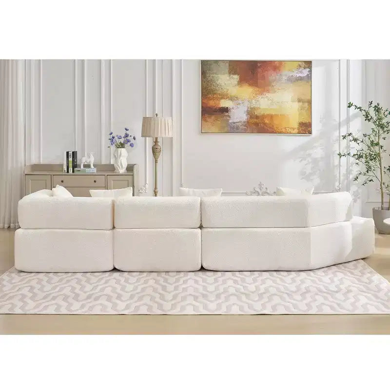 Canapé d'angle moderne 4 places en bouclette GDFStudio Arvik 140 avec 4 coussins