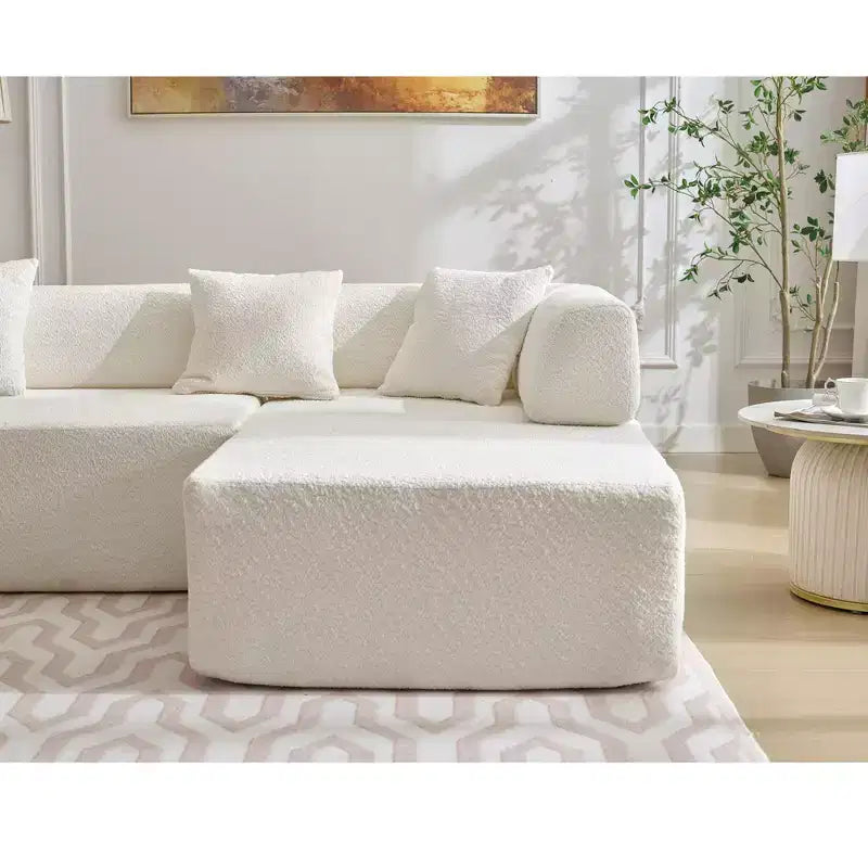 Canapé d'angle moderne 4 places en bouclette GDFStudio Arvik 140 avec 4 coussins