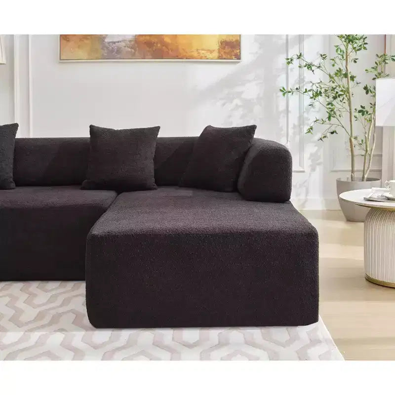 Canapé d'angle moderne 4 places en bouclette GDFStudio Arvik 140 avec 4 coussins