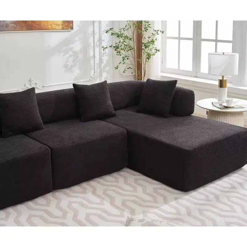 Canapé d'angle moderne 4 places en bouclette GDFStudio Arvik 140 avec 4 coussins