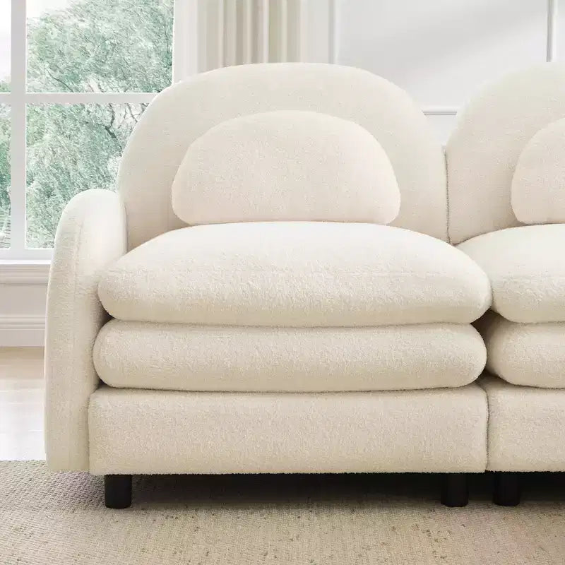 Canapé sectionnel 2 places moderne Steini 117 de GDFStudio, rembourré en tissu peluche, avec coussins lombaires incurvés et pouf mobile
