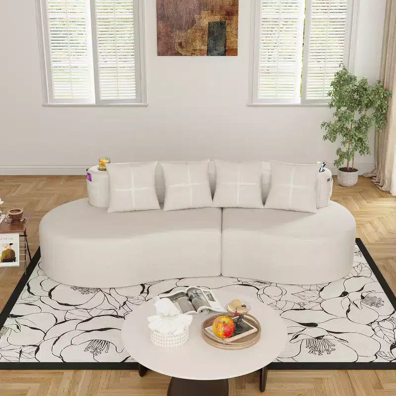 Canapé d'angle modulable incurvé, canapé 3 places avec porte-gobelets, pochette latérale et 4 oreillers pour salon, bureau, appartement - ModernLuxe
