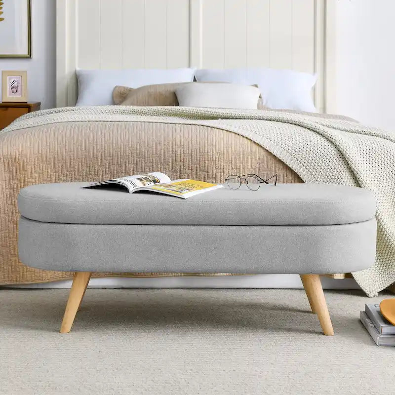 Pouffe de rangement ovale – Tissu plissé, pieds en bois d'hévéa (beige / blanc / gris), 2 places