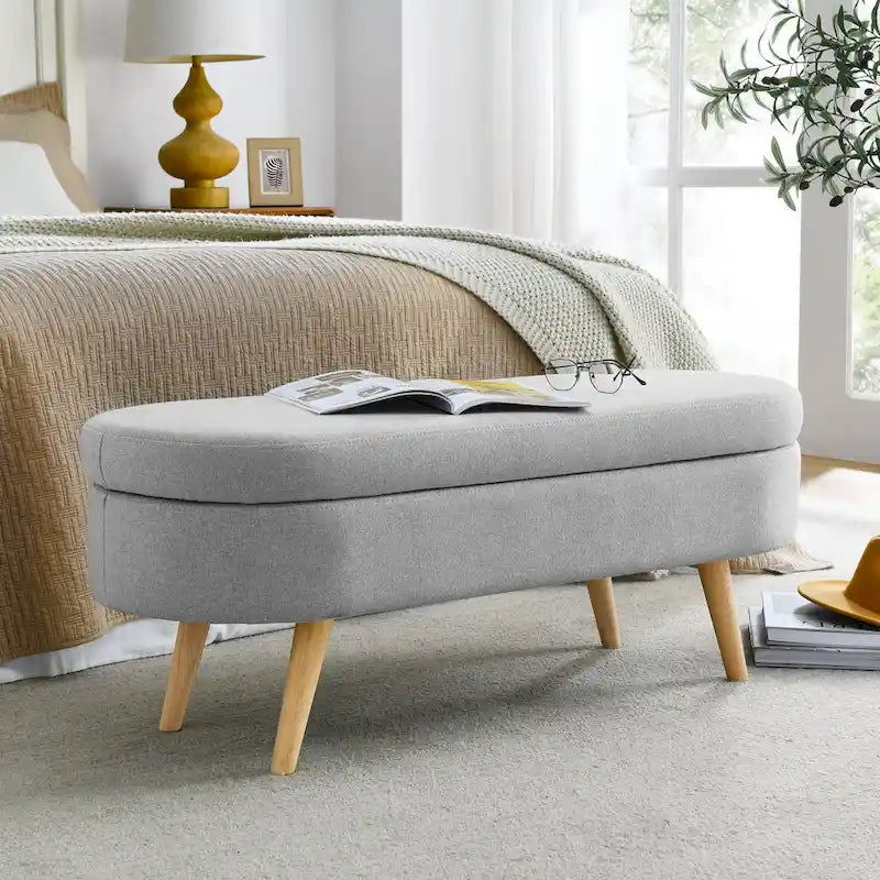 Pouffe de rangement ovale – Tissu plissé, pieds en bois d'hévéa (beige / blanc / gris), 2 places