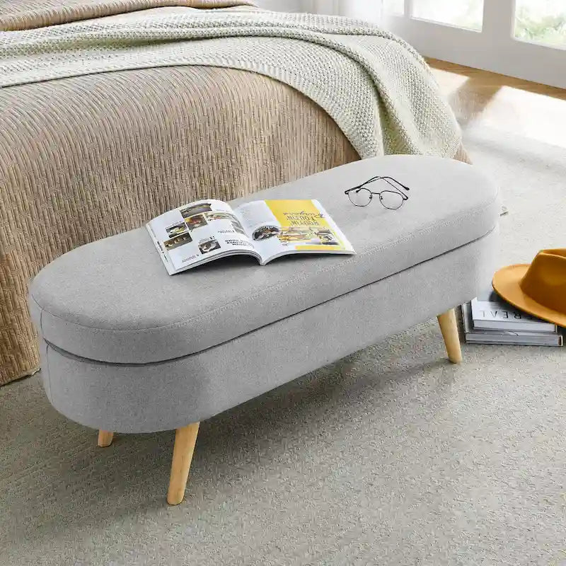 Pouffe de rangement ovale – Tissu plissé, pieds en bois d'hévéa (beige / blanc / gris), 2 places